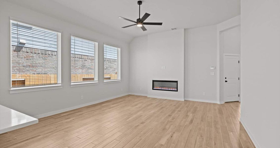 Representative unfurnished interior of a home built from the Marshall by Chesmar Homes in Village at Three Oaks, Seguin (Image 9).