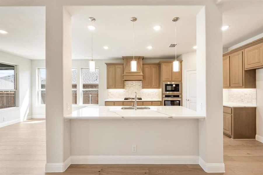 Furnished interior view inside a new home in Country Lakes Classic 60, Argyle (Image 12).