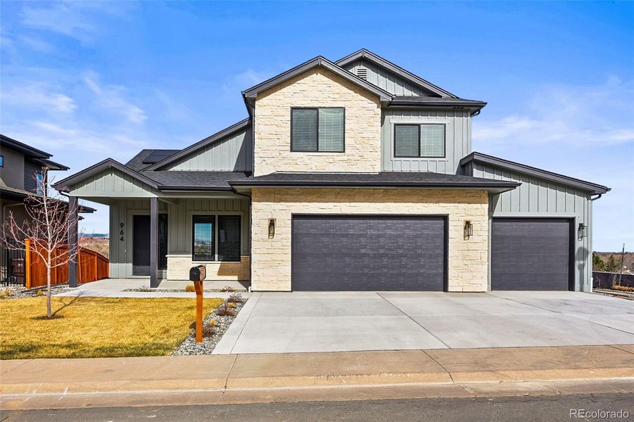Front exterior of a new home in , Louisville, CO, highlighting curb appeal (Image 1). Front exterior of a new home in , Louisville, CO, highlighting curb appeal (Image 1).