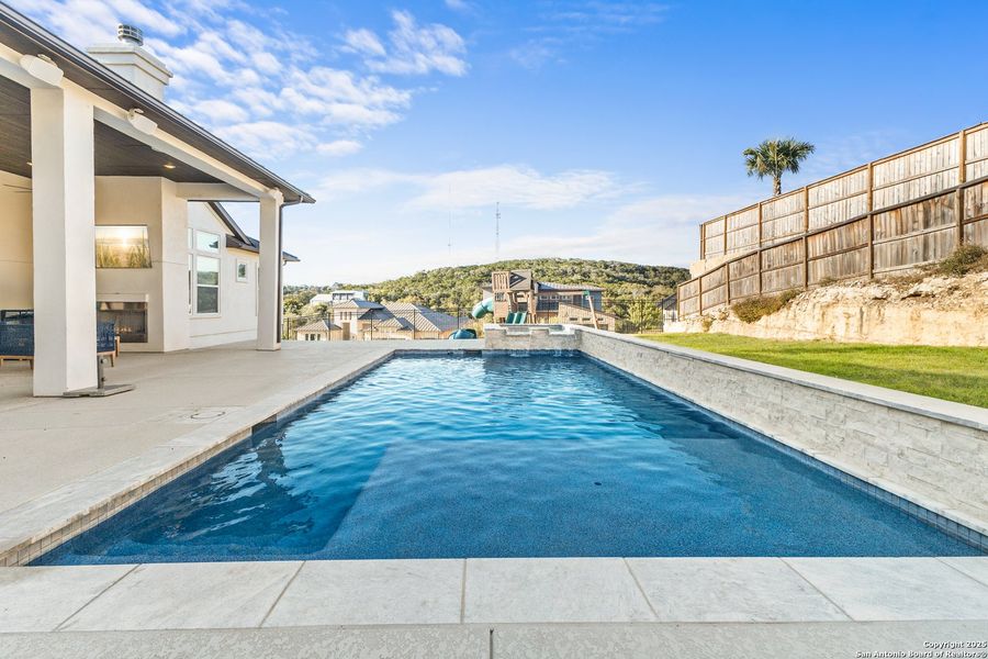 Exterior details and patio area of a home in , San Antonio (Image 25).