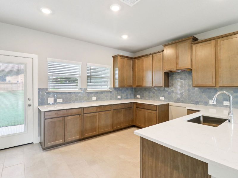 Furnished interior view inside a new home in Kallison Ranch, San Antonio (Image 7).