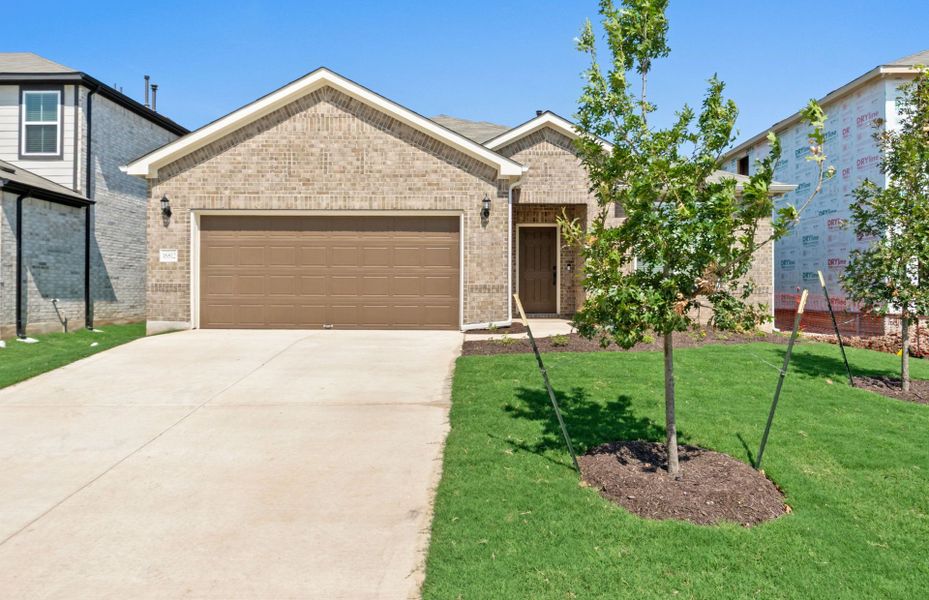 Representative exterior photo of a completed home built from the Burnet by Pulte Homes in Lagos, Manor, TX (Image 18).