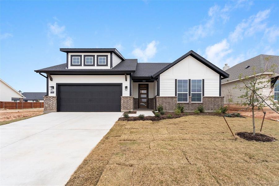 Front exterior of a new home in Covenant Park, Springtown, TX, highlighting curb appeal (Image 22).