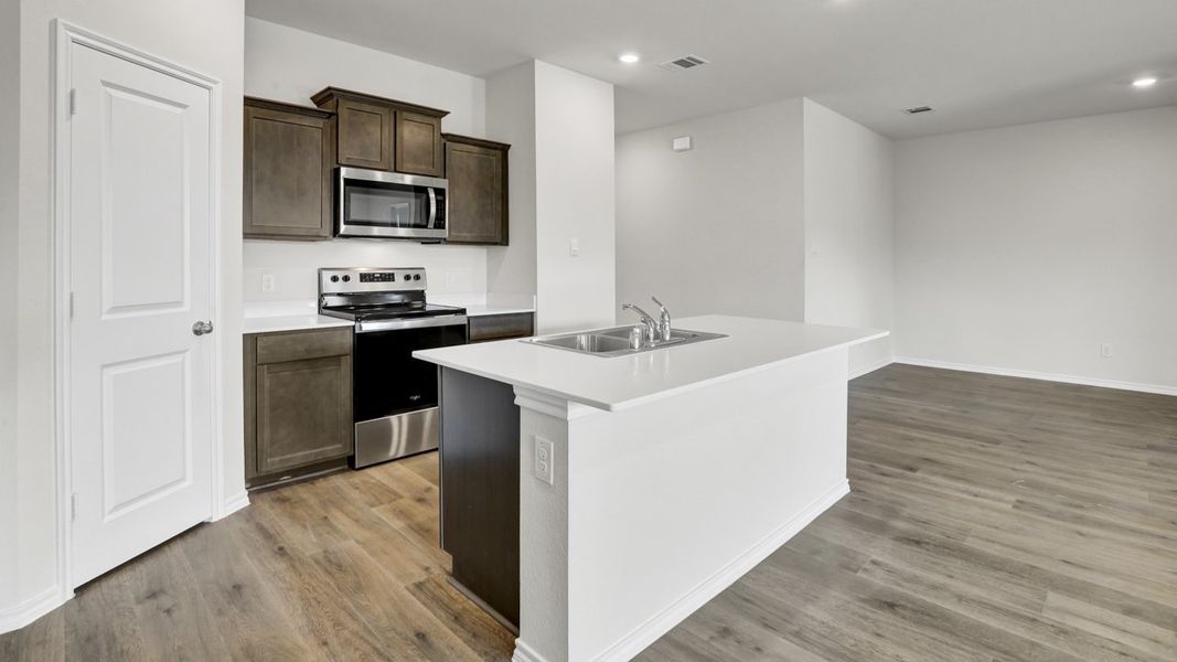 Furnished interior view inside a new home in Valor Farms, Royse City (Image 6).