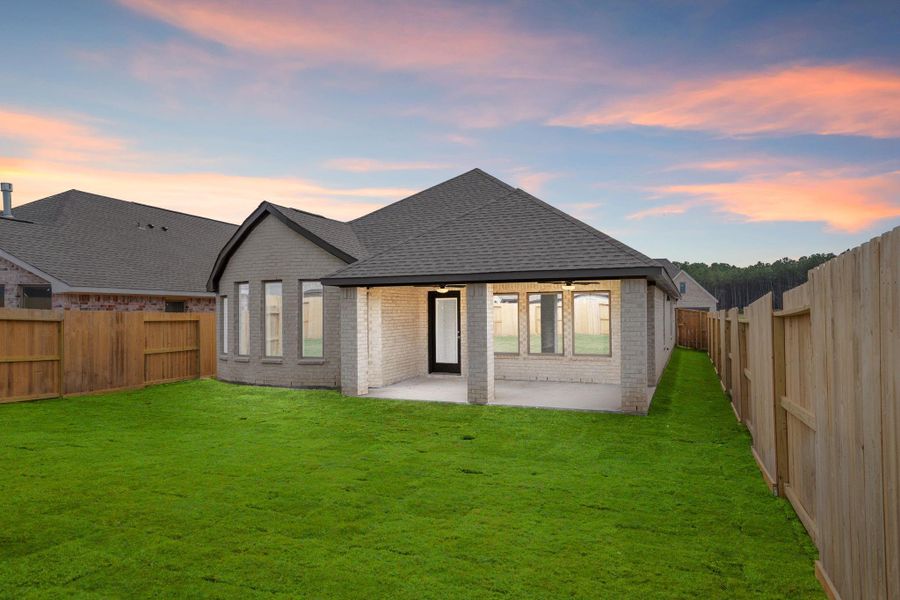 Exterior details and patio area of a home in The Highlands 45', Porter (Image 22).