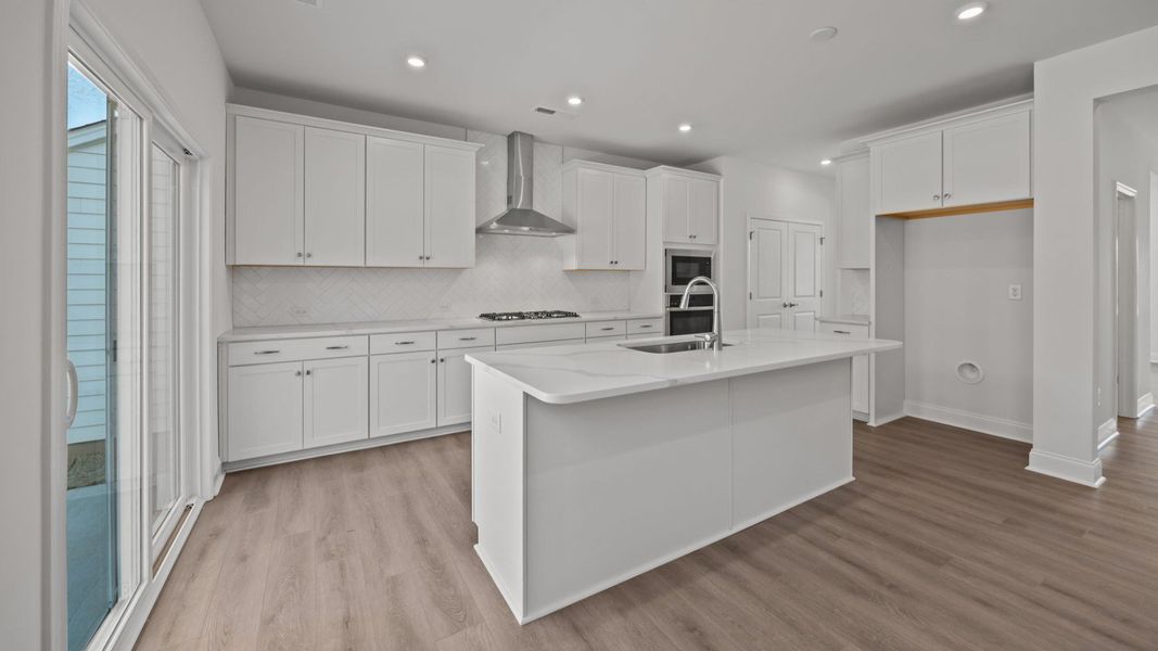 The Burton Plan in Farms at Bellingham by DRB Homes in Charlotte NC - Kitchen