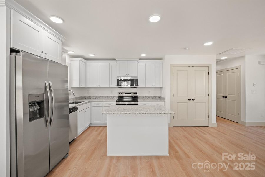 Furnished interior view inside a new home in , Newton (Image 3).
