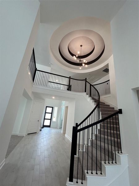 Architectural charm, Sophisticated entry with circular staircase Architectural charm, Sophisticated entry with circular staircase