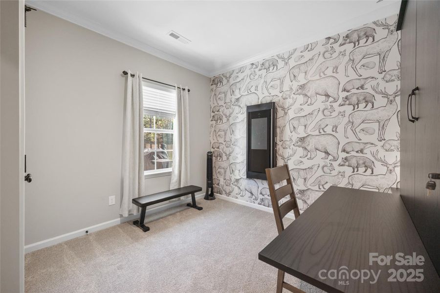 Guest bedroom/office on the main. Guest bedroom/office on the main.