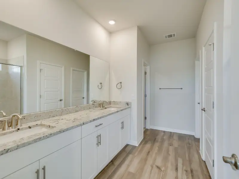 Furnished interior view inside a new home in Butler Farms - Boulevard Collection, Liberty Hill (Image 4).