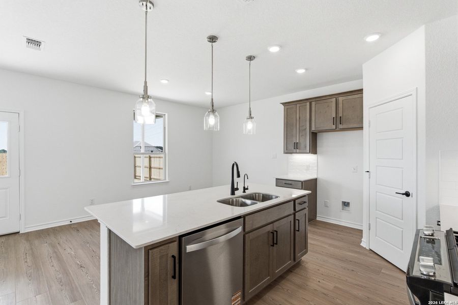 Furnished interior view inside a new home in Nopal Valley, San Antonio (Image 7).
