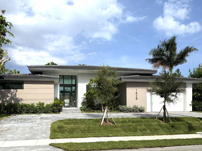 Front exterior of a new home in , Hollywood, FL, highlighting curb appeal (Image 2). Front exterior of a new home in , Hollywood, FL, highlighting curb appeal (Image 2).