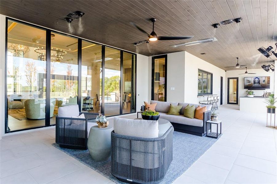 View of patio / terrace with an outdoor living space and ceiling fan View of patio / terrace with an outdoor living space and ceiling fan