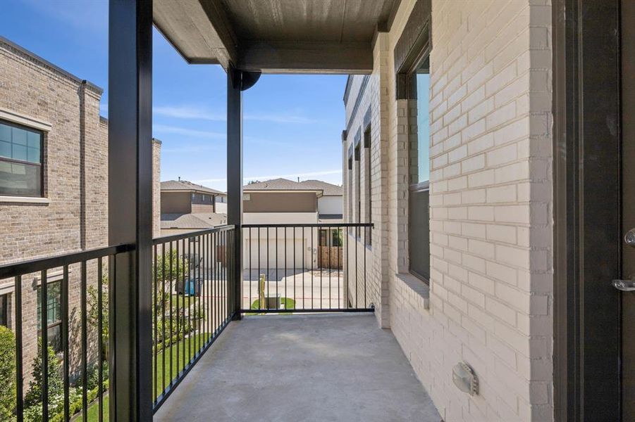View of balcony off of secondary bedroom. View of balcony off of secondary bedroom.