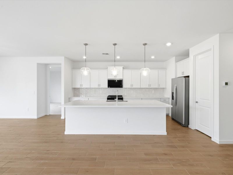 Spacious, unfurnished interior of a new home in Rancho Mirage Signature Series, Maricopa (Image 12).