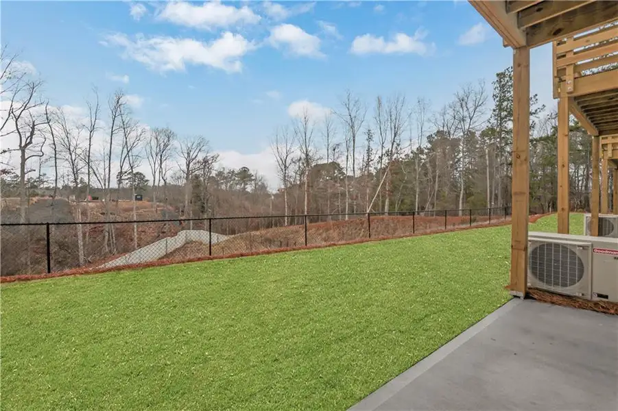 Exterior details and patio area of a home in Towne Village at Suwanee Dam, Sugar Hill (Image 2). Exterior details and patio area of a home in Towne Village at Suwanee Dam, Sugar Hill (Image 2).