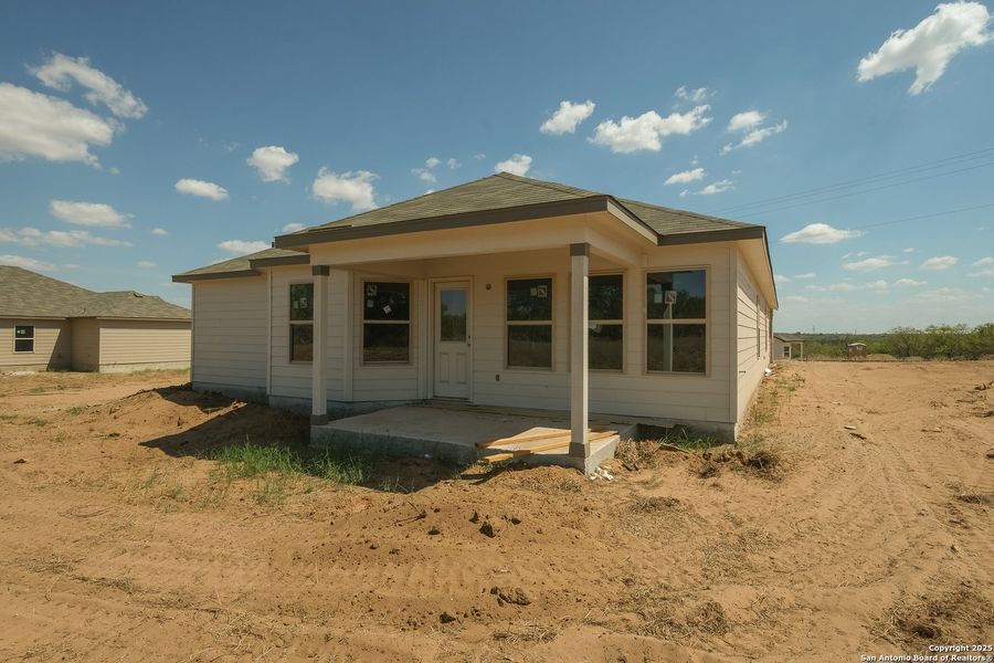 Exterior details and patio area of a home in Chaparral Ranch, Floresville (Image 18). Exterior details and patio area of a home in Chaparral Ranch, Floresville (Image 18).