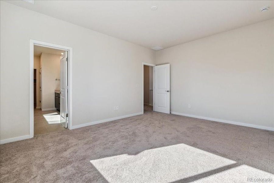 Spacious, unfurnished interior of a new home in Floret Collection at Alder Creek, Parker (Image 23).