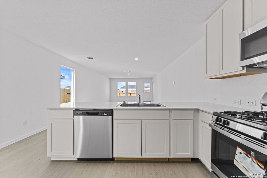 Furnished interior view inside a new home in , New Braunfels (Image 5).