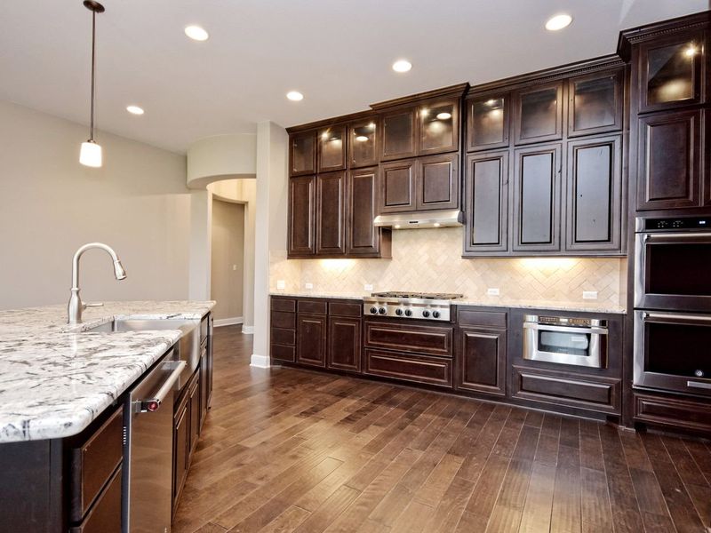 Representative furnished interior of a home built from the Madera II by Giddens Homes in Scofield Farms Estates, Georgetown (Image 214).