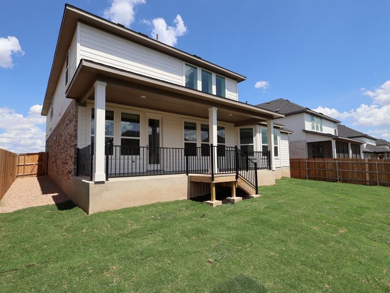 Front exterior of a new home in Edgewood, Leander, TX, highlighting curb appeal (Image 19).
