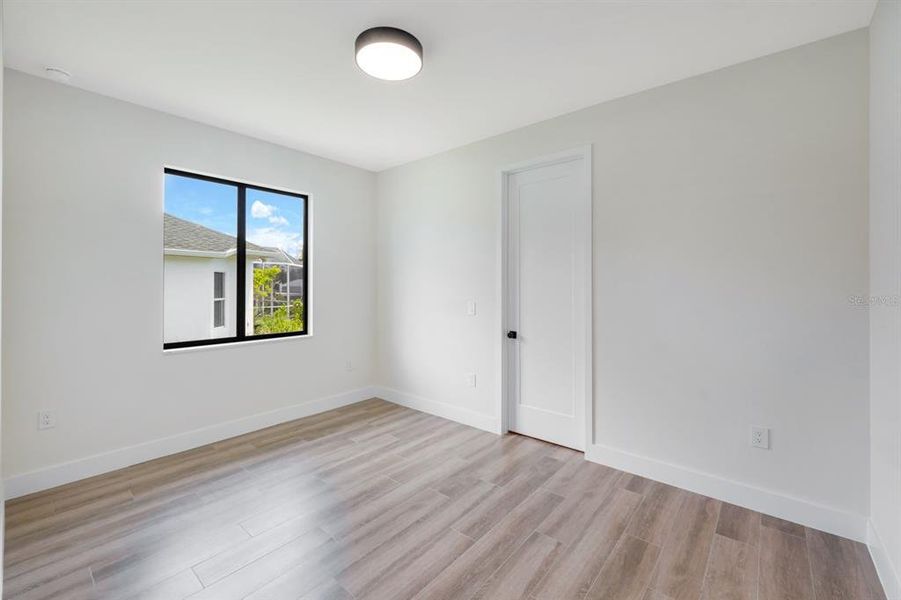 Spacious, unfurnished interior of a new home in , Port Charlotte (Image 17).