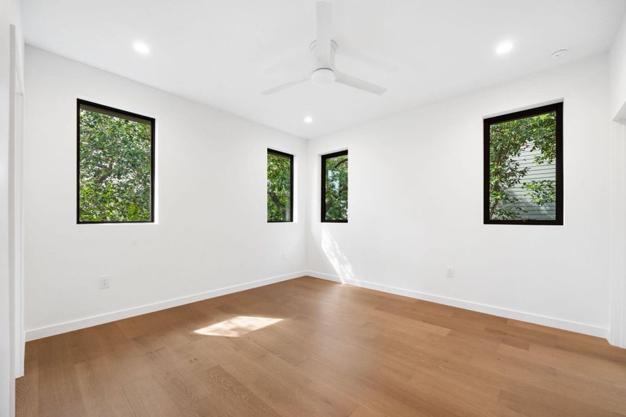 Spare room featuring recessed lighting, wood finished floors, and ceiling fan