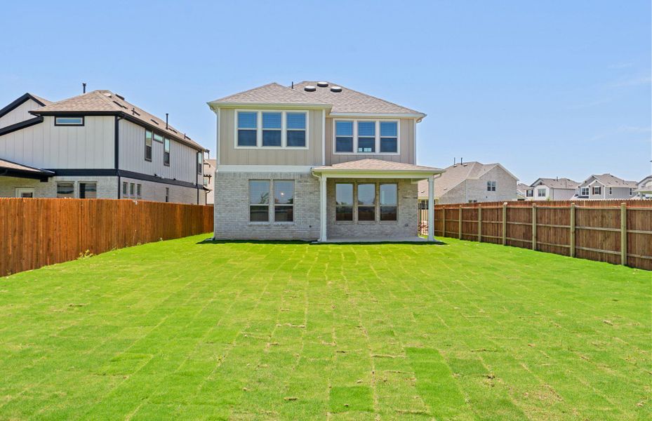 Exterior details and patio area of a home in Santa Rita Ranch, Liberty Hill (Image 22).