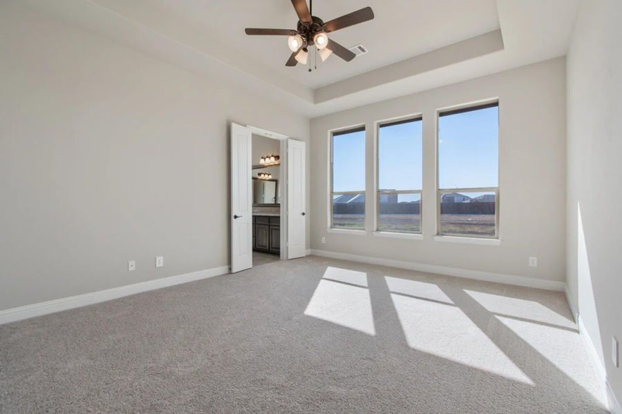 Primary Bedroom | Concept 2586 at Hidden Creek Estates in Van Alstyne, TX by Landsea Homes