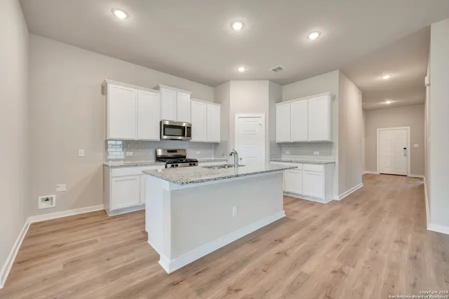 Furnished interior view inside a new home in Winding Brook, San Antonio (Image 5).
