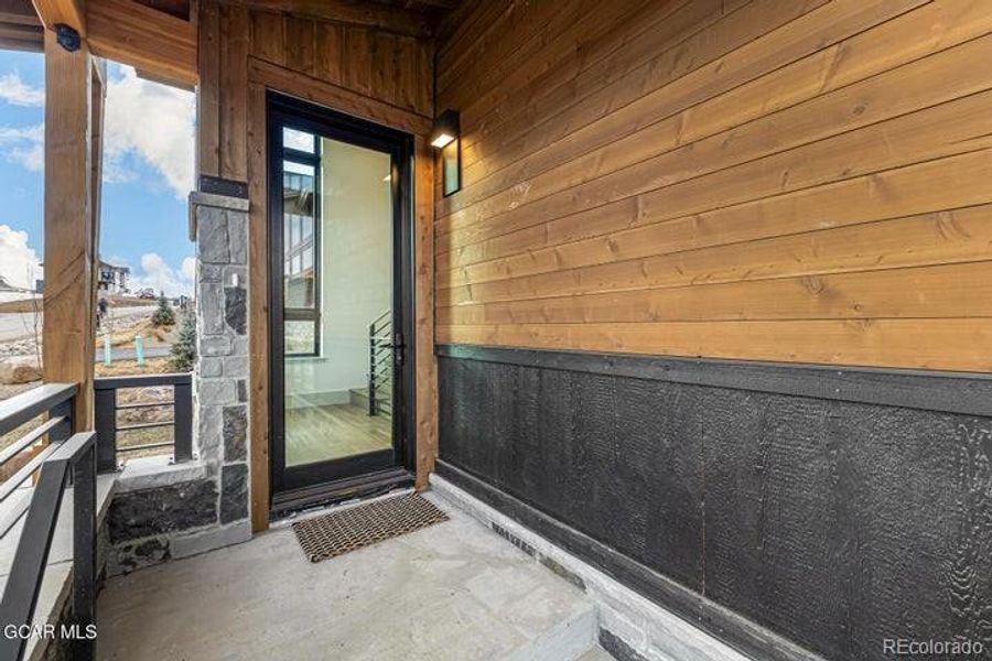 Exterior details and patio area of a home in , Granby (Image 24).