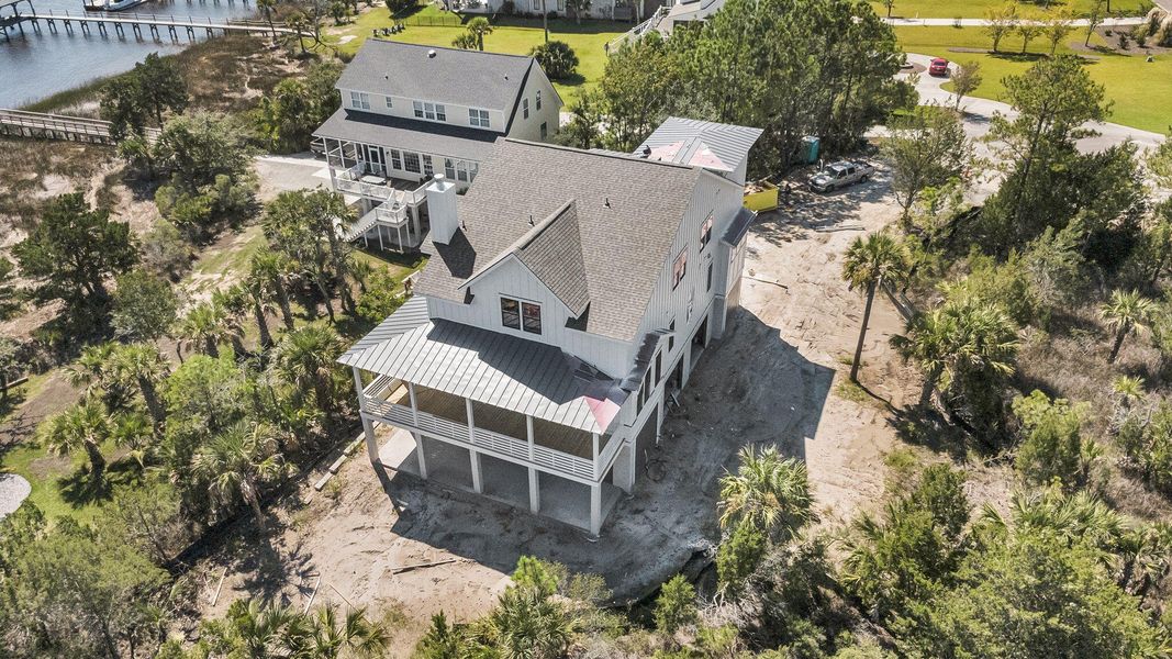 Front exterior of a new home in , Awendaw, SC, highlighting curb appeal (Image 2). Front exterior of a new home in , Awendaw, SC, highlighting curb appeal (Image 2).