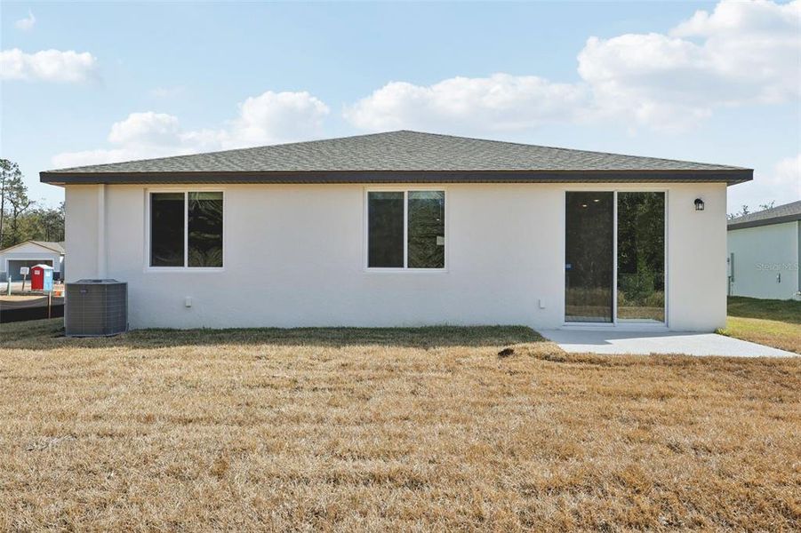 Exterior details and patio area of a home in Leyland Preserve - Classic Series, Brooksville (Image 4).