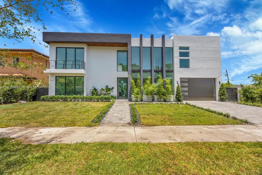 Front exterior of a new home in , Miami, FL, highlighting curb appeal (Image 2). Front exterior of a new home in , Miami, FL, highlighting curb appeal (Image 2).