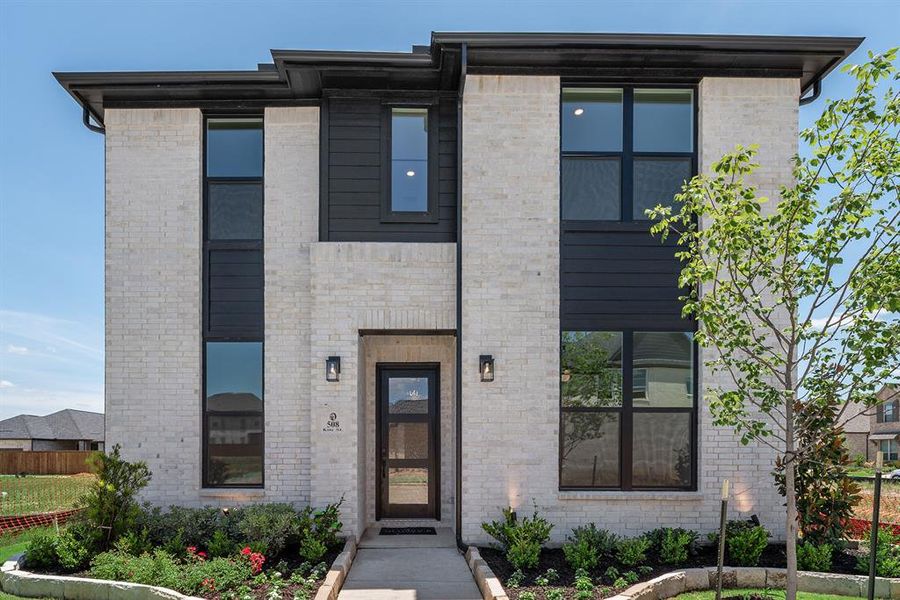 Exterior details and patio area of a home in Cottages of Celina, Celina (Image 3).