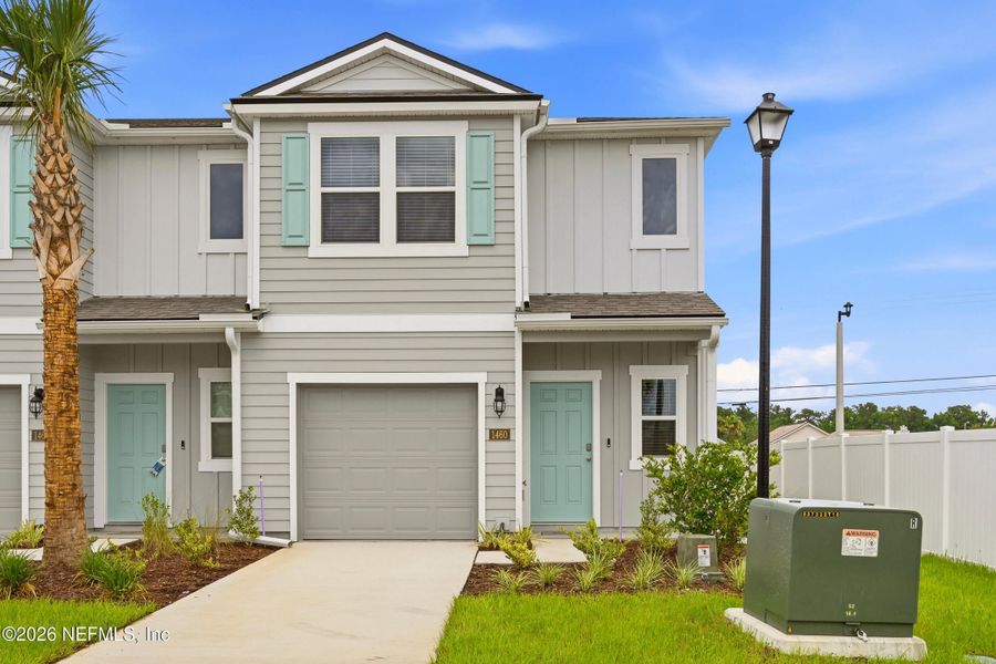 Front exterior of a new home in , Middleburg, FL, highlighting curb appeal (Image 16). Front exterior of a new home in , Middleburg, FL, highlighting curb appeal (Image 16).