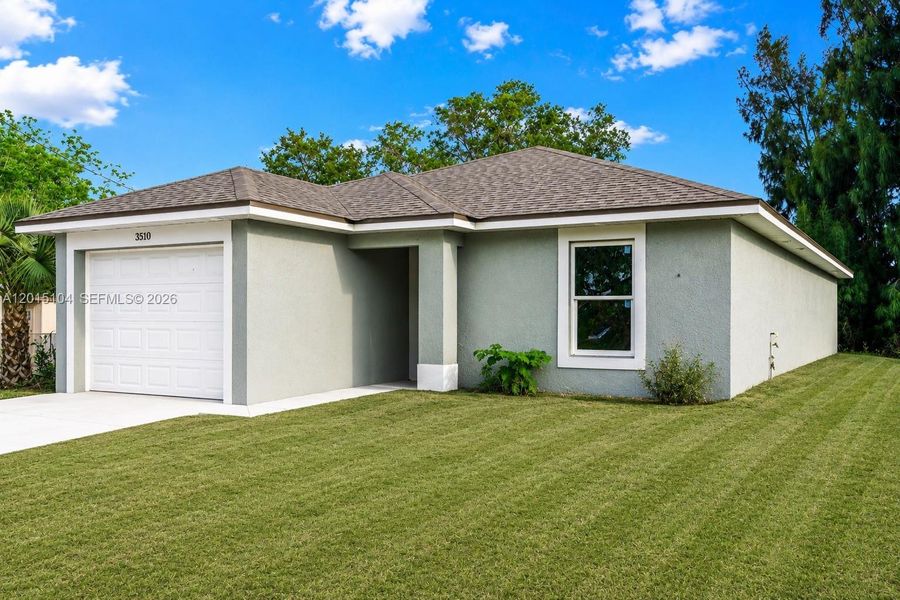 Front exterior of a new home in , Fort Myers, FL, highlighting curb appeal (Image 21). Front exterior of a new home in , Fort Myers, FL, highlighting curb appeal (Image 21).