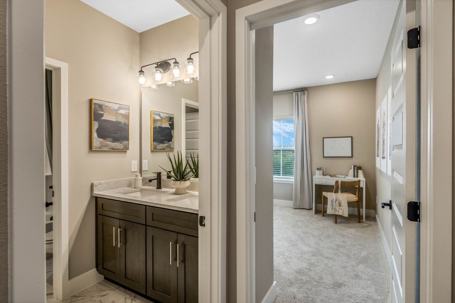 Furnished interior view inside a new home in Harvest at Ovation - Townhomes, Winter Garden (Image 33).