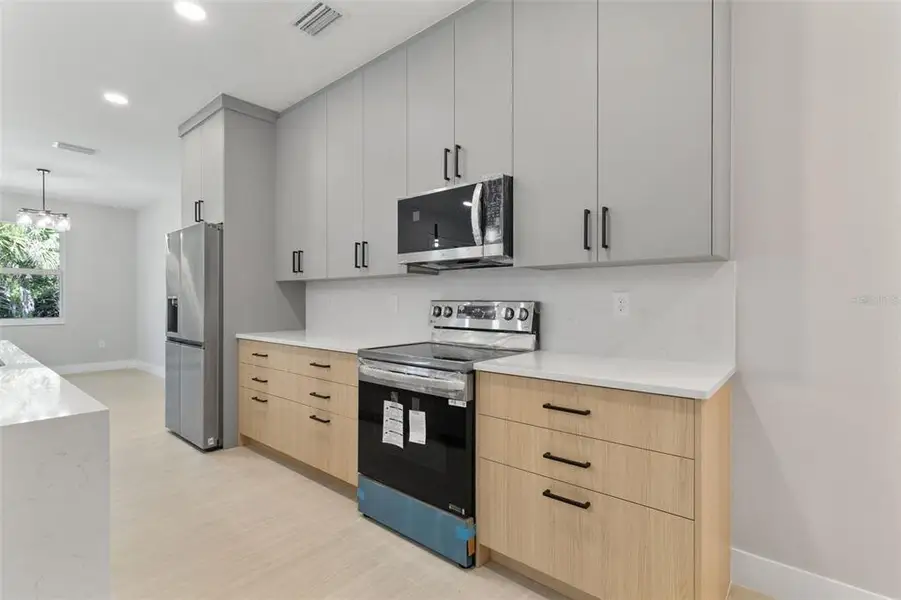 Furnished interior view inside a new home in , Port Charlotte (Image 14).