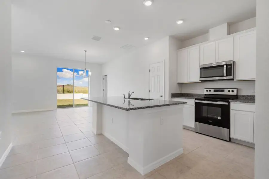 Furnished interior view inside a new home in Eden Hills, Lake Alfred (Image 3).