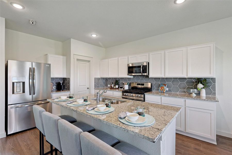 Model home photos of similar floorplans, not pictures of actual home.