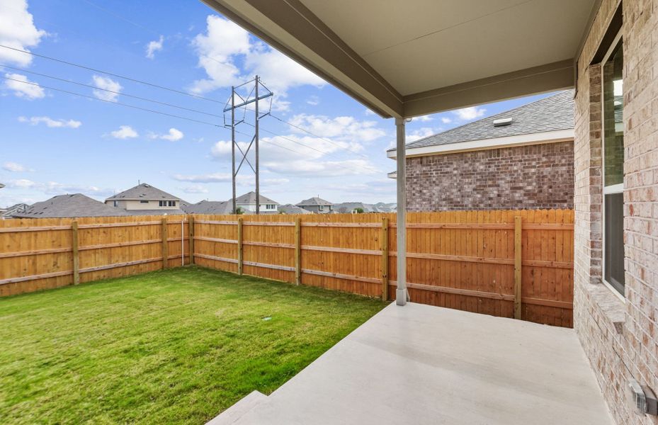 Exterior details and patio area of a home in Crosswinds, Kyle (Image 26).