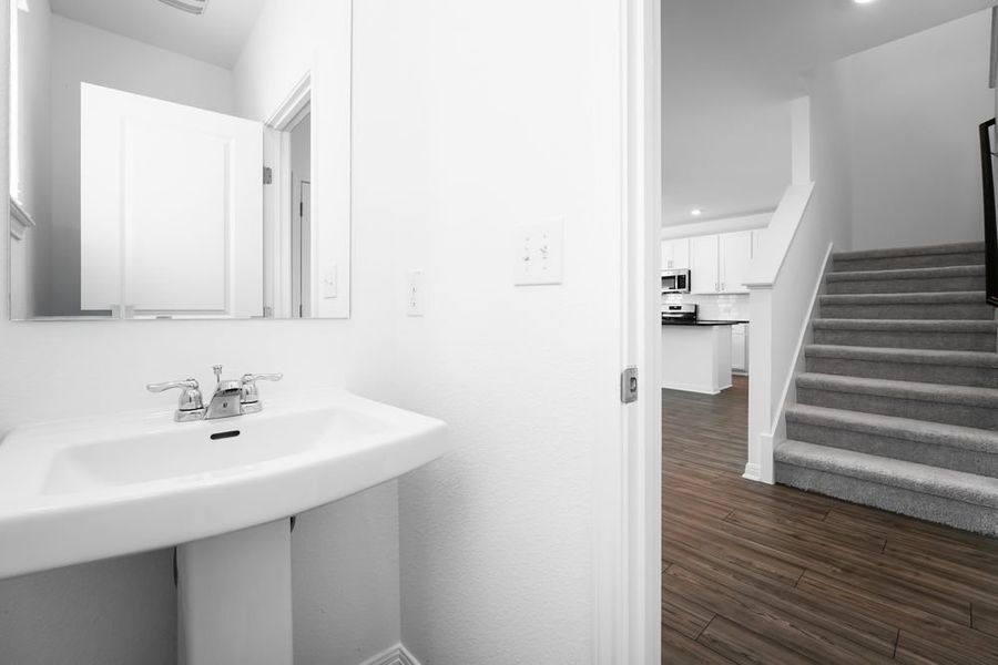 Furnished interior view inside a new home in Longview 40s, Del Valle (Image 6).