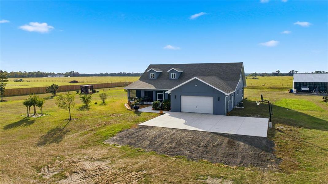 Front exterior of a new home in , Dade City, FL, highlighting curb appeal (Image 27).