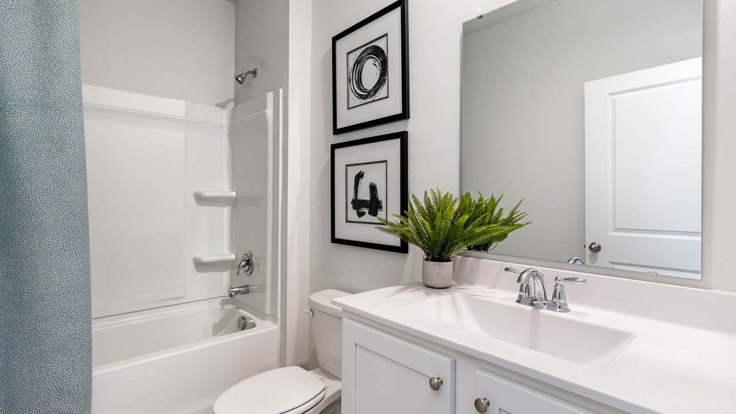 Representative furnished interior of a home built from the CALI by D.R. Horton in Sandridge Park, Little River (Image 5).