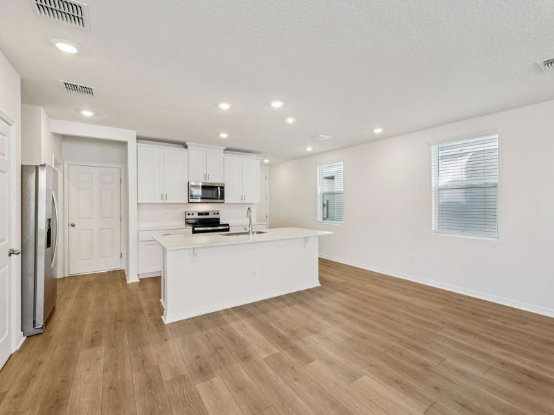 Furnished interior view inside a new home in The Meadow at Crossprairie Townes, St. Cloud (Image 3). Furnished interior view inside a new home in The Meadow at Crossprairie Townes, St. Cloud (Image 3).