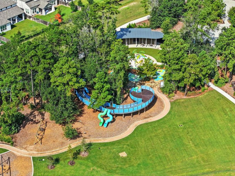 Residents enjoy resort-style amenities including a 5-acre lake with paddle boats, miles of nature trails, a state-of-the-art fitness center, splash pad, playgrounds, and even a community café right in the neighborhood. Residents enjoy resort-style amenities including a 5-acre lake with paddle boats, miles of nature trails, a state-of-the-art fitness center, splash pad, playgrounds, and even a community café right in the neighborhood.