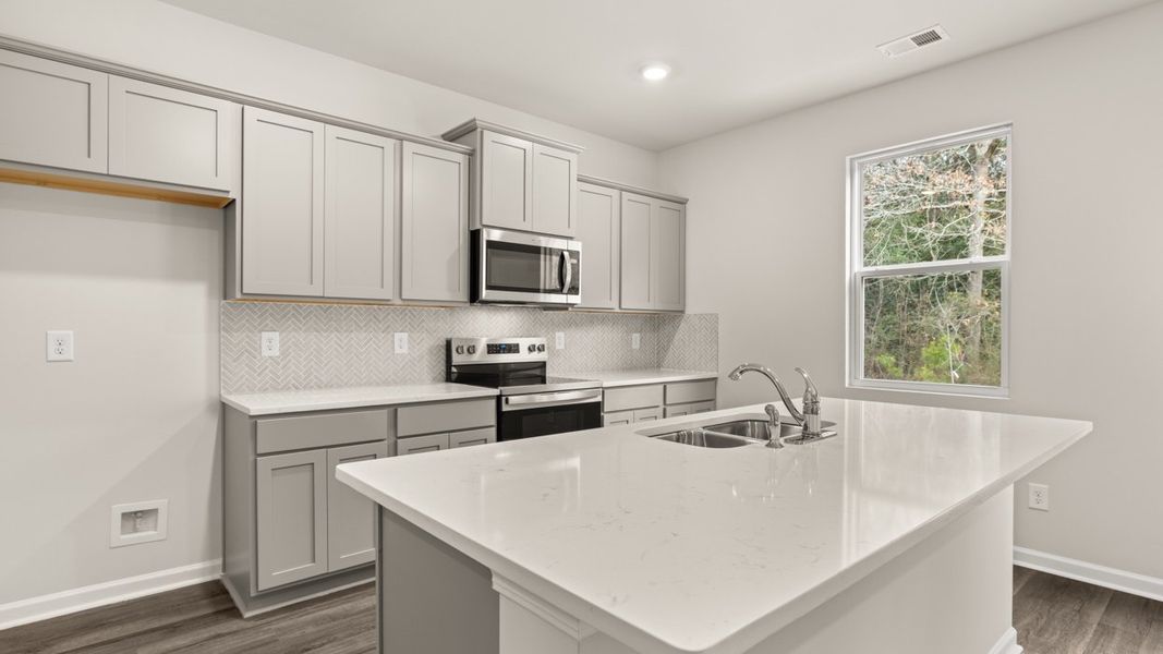 Representative furnished interior of a home built from the Galen by D.R. Horton in The Reserve at Calcutta, Stockbridge (Image 6).