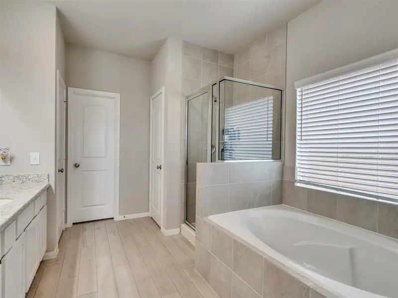 Furnished interior view inside a new home in Park Lakes East, Humble (Image 10).