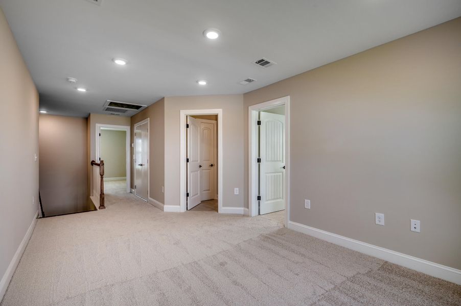 Spacious, unfurnished interior of a new home in The Groves of Berkeley, Moncks Corner (Image 32).